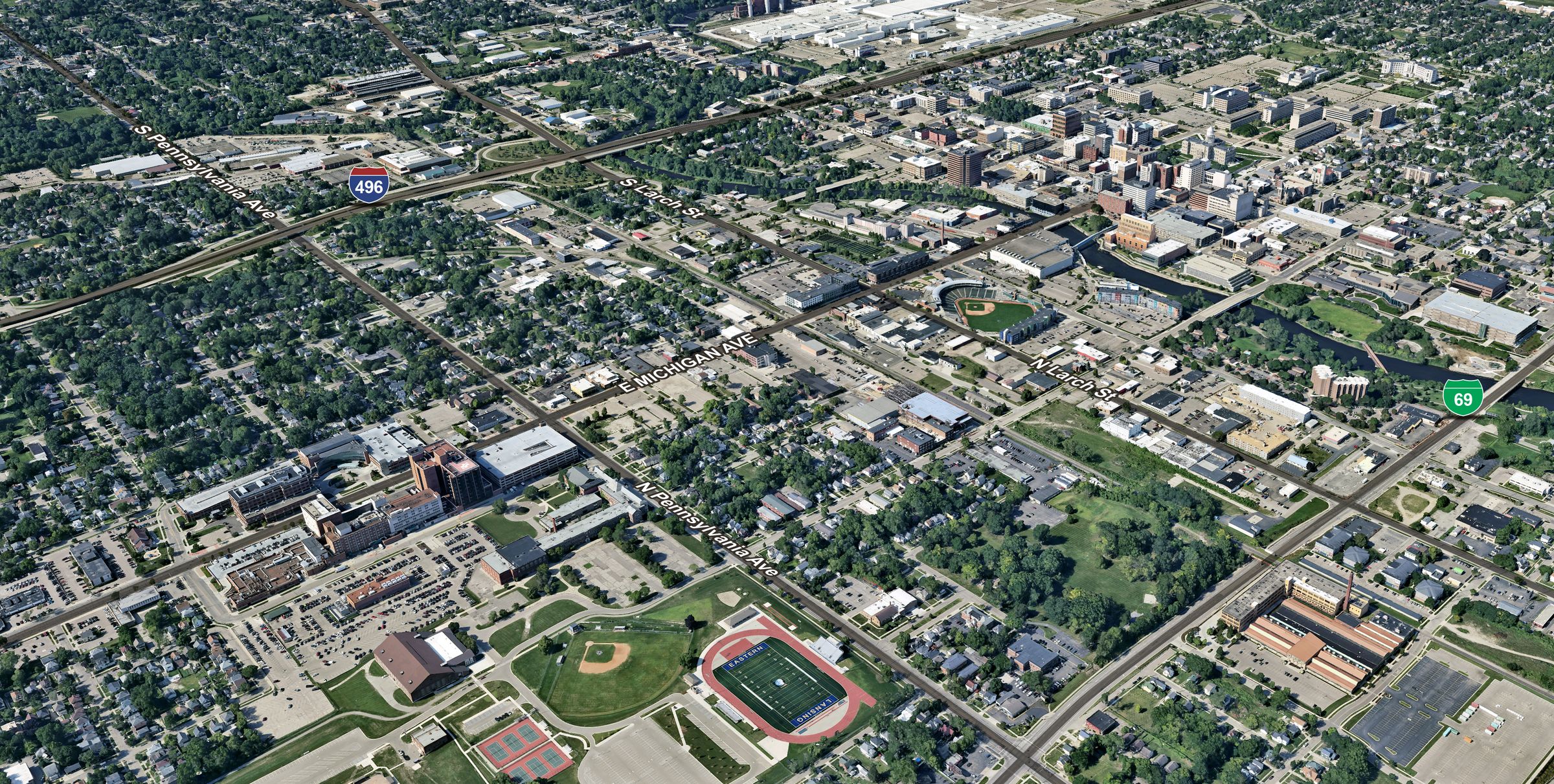Aerial of downtown Lansing showing the Property and key demand generators
